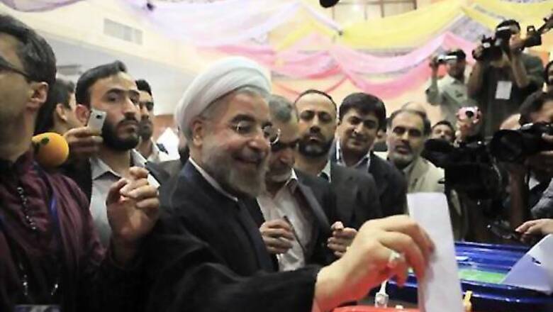 Iran polls: Moderate cleric Rohani on course for an outright win