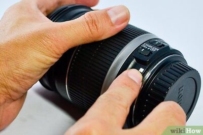 How to Attach a Camera Lens to a Canon