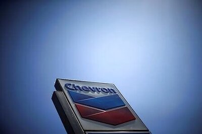 Chevron posts quarterly loss on more than $5 bln charges due to oil downturn