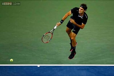Federer saves two match points, reaches US Open semifinal