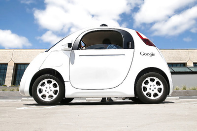 Google bullish on self-driving car project; posts dozens of manufacturing jobs