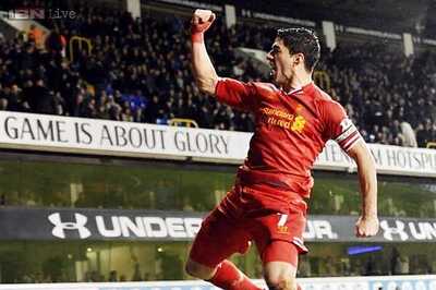 Suarez's double sends Liverpool top of EPL