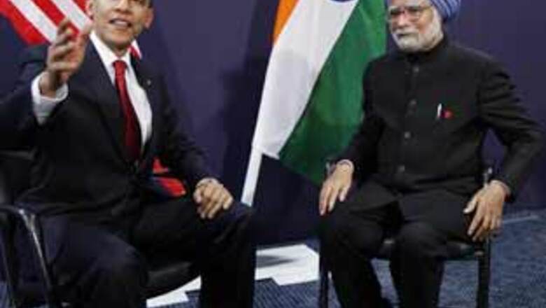  G20: Obama, Manmohan meet |  G20 passes $1-tn deal