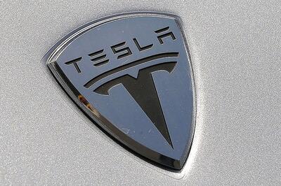 Tesla drops 'Motors' from name as CEO Musk looks beyond cars
