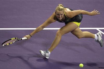 Wozniacki reaches semis in Doha, seals No. 1 spot