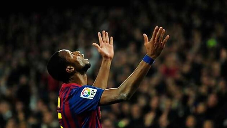 Ten-man Barcelona sink Sporting Gijon