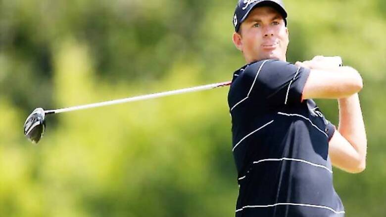 Webb Simpson leads by one shot at Firestone Country Club