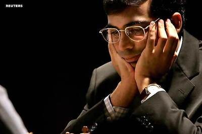 Anand held by Yifan Hou; slips to third spot