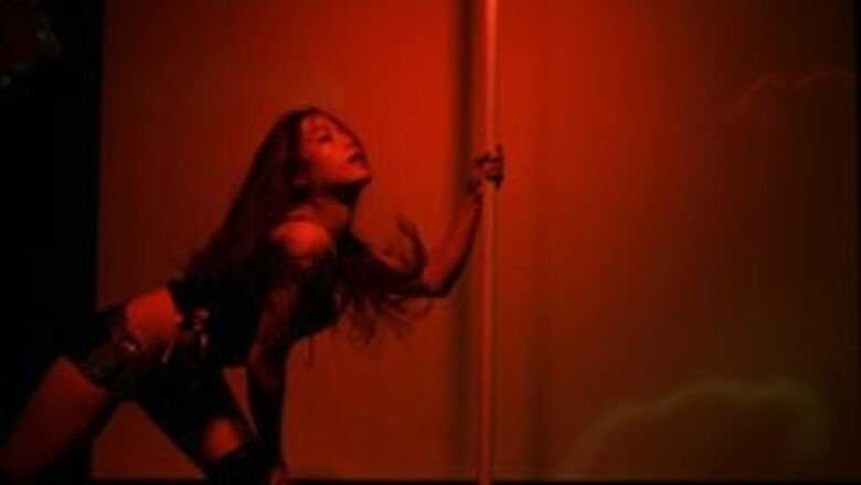 Chinese pole dance their way to fitness