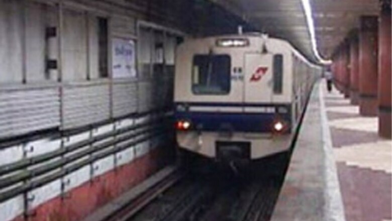 Smoke comes out of a Kolkata Metro train