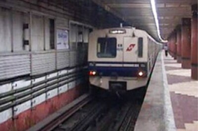 Smoke comes out of a Kolkata Metro train