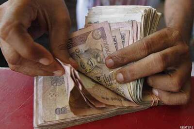 Rupee down 10 paise against dollar in early trade