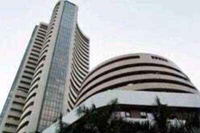 Sensex closes above 13,000 mark