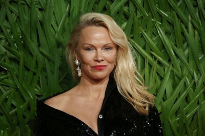 ‘I Love Him’: Pamela Anderson Gets Emotional After Meeting Julian Assange in Prison