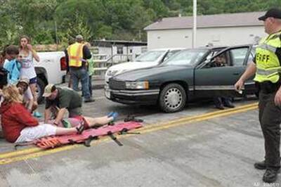 Dozens injured as car plows through parade in Virginia