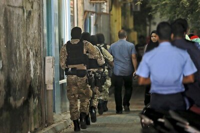 Maldives police raid TV station as alleged IS video threatens to kill President Yameen