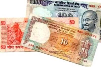 Rupee holds steady against dollar