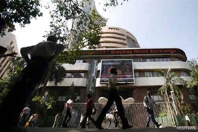 Sensex falls 11.66 points to end at 20,217.39