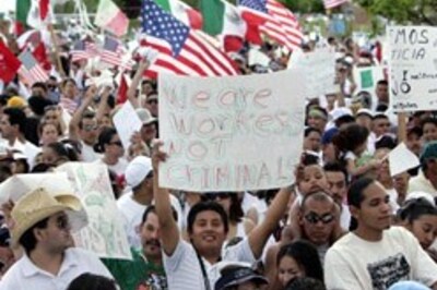 Immigrants show might, march in US
