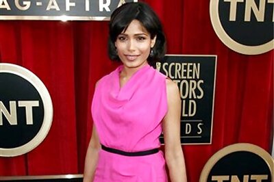 Snapshot: Freida Pinto breaks monotone with bright pink gown