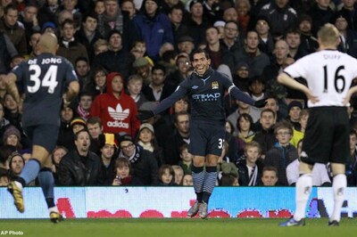 Man City wins to close in on league leaders