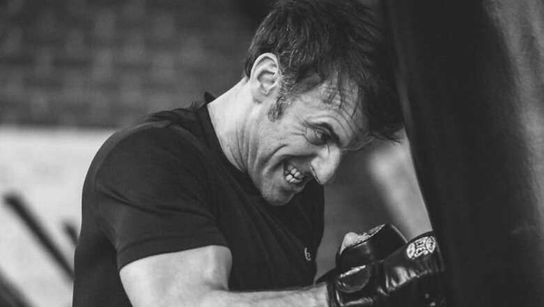 ‘Macho’ Macron Pictured Pounding Punching Bag In Moody Black And White Photos, World Takes Note