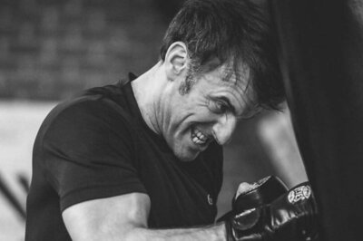 ‘Macho’ Macron Pictured Pounding Punching Bag In Moody Black And White Photos, World Takes Note