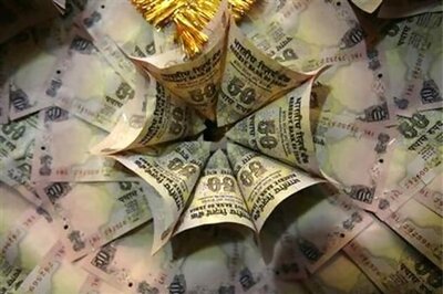 Rupee near record low; RBI intervention eyed