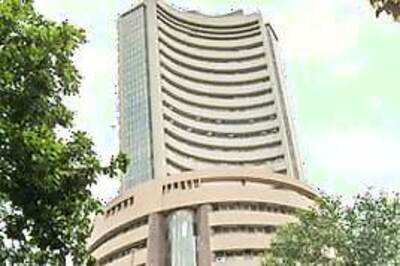 Sensex ends over 185 points up