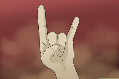 Why Do Metal Fans Make the Devil Hand Sign? Meaning & History