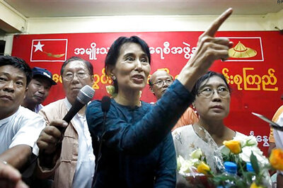 Suu Kyi ends boycott, to be sworn in on Wednesday