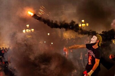 Crowds Protesting Virus Curbs Clash With Police In Barcelona