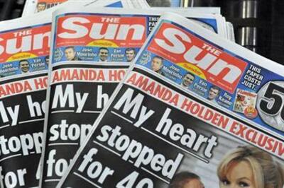 UK: The Sun's politics editor charged over bribery