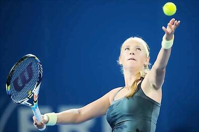 Defending champ Azarenka battles her way to fourth round