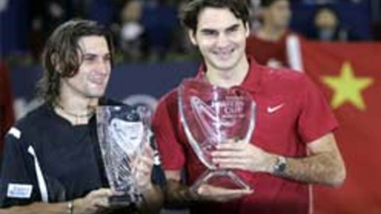 Federer blasts Ferrer to win fourth Masters Cup