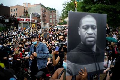 George Floyd's Family Sues Minneapolis and Four Officers over His Death