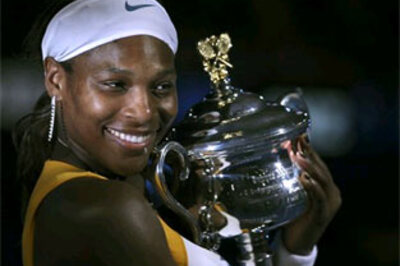Serena beats Henin, retains Australian Open title