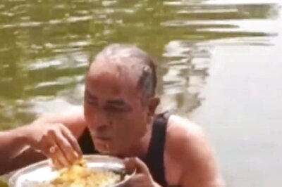 Bengal Man Eats Rice In Pond Amid Scorching Heat