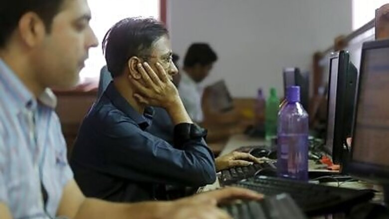 Sensex, Nifty settle higher after RBI keeps rate steady
