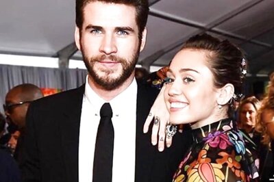 Miley Cyrus, Liam Hemsworth Make a Rare Red Carpet Appearance