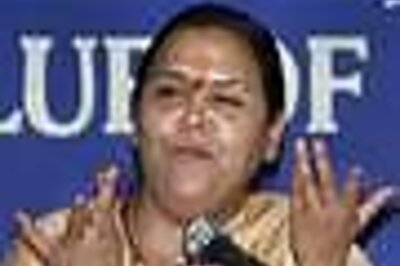 Uma travels with Advani, heading back to BJP?