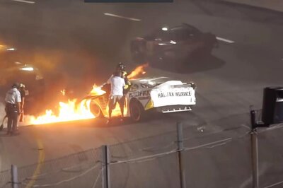 Father Saves Son from Burning Racecar Before Safety Crew Does - Watch Video
