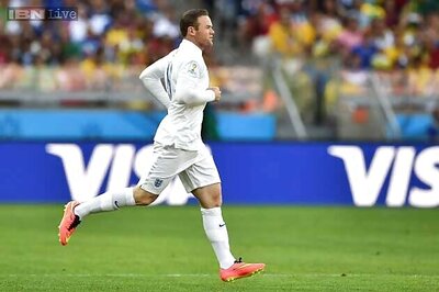 Captain Rooney's penalty spares England's blushes