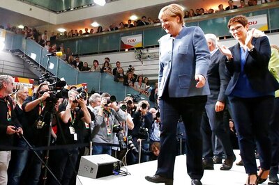 Angela Merkel Hangs on to Power in Germany But Bleeds Support to Surging Far Right