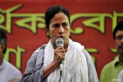 No industrialisation by selling the country : Mamata