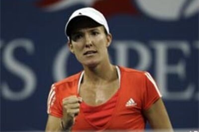 Henin ousts Serena, enters US Open semis