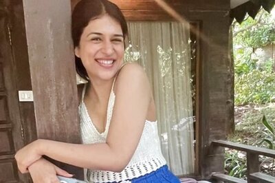 Actress Shraddha Das Aces Casual Look In A White Knitted Crop Top And Blue Shorts