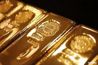 Gold futures hit 15-month low of Rs 27,100 per 10 gram