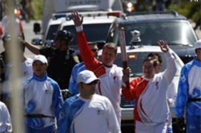 Olympic torch plays hide and seek in San Francisco