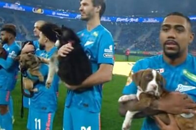 Watch: Footballers Walk Into Stadium Holding Homeless Puppies To Promote Adoption